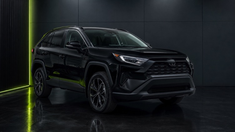 Black SUV in a dealership photo studio
